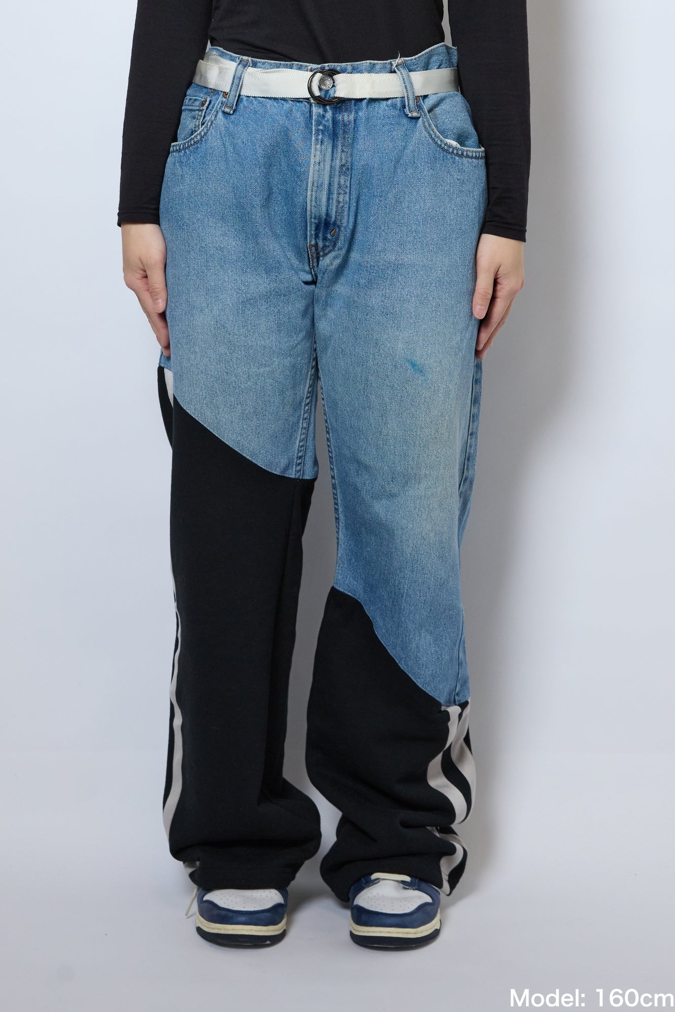 DIAGONAL-CUT DENIM PANTS