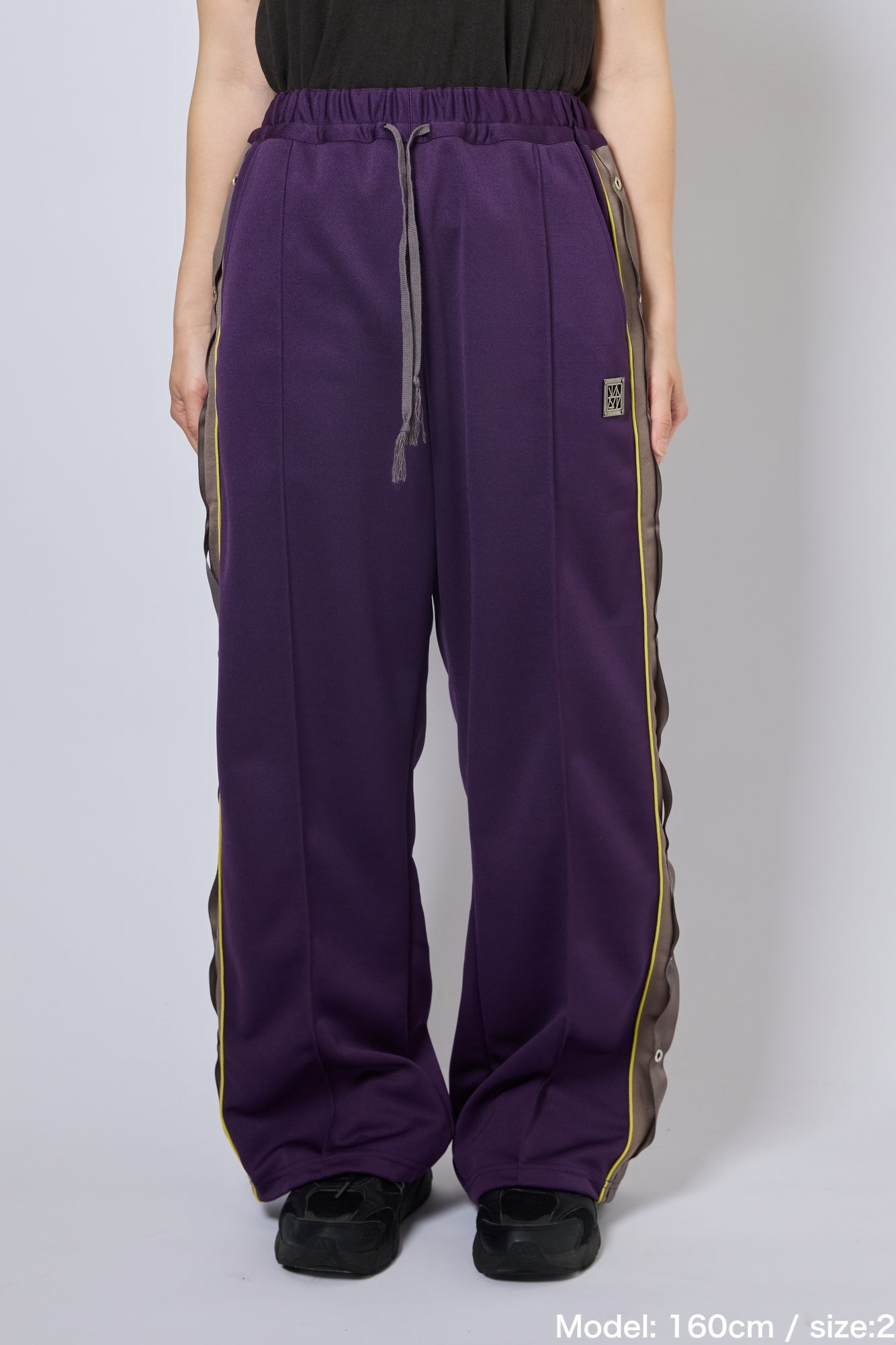 EYELET TRACK PANTS