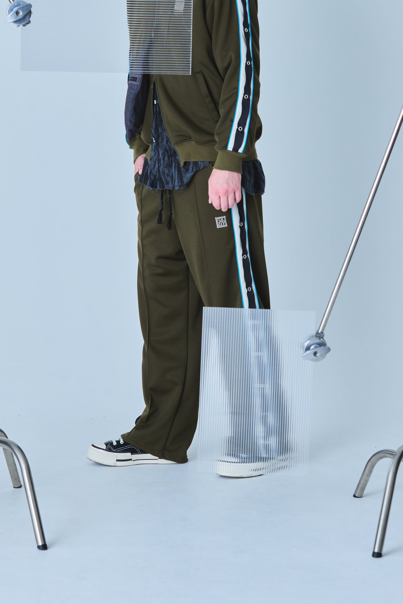 EYELET TRACK PANTS