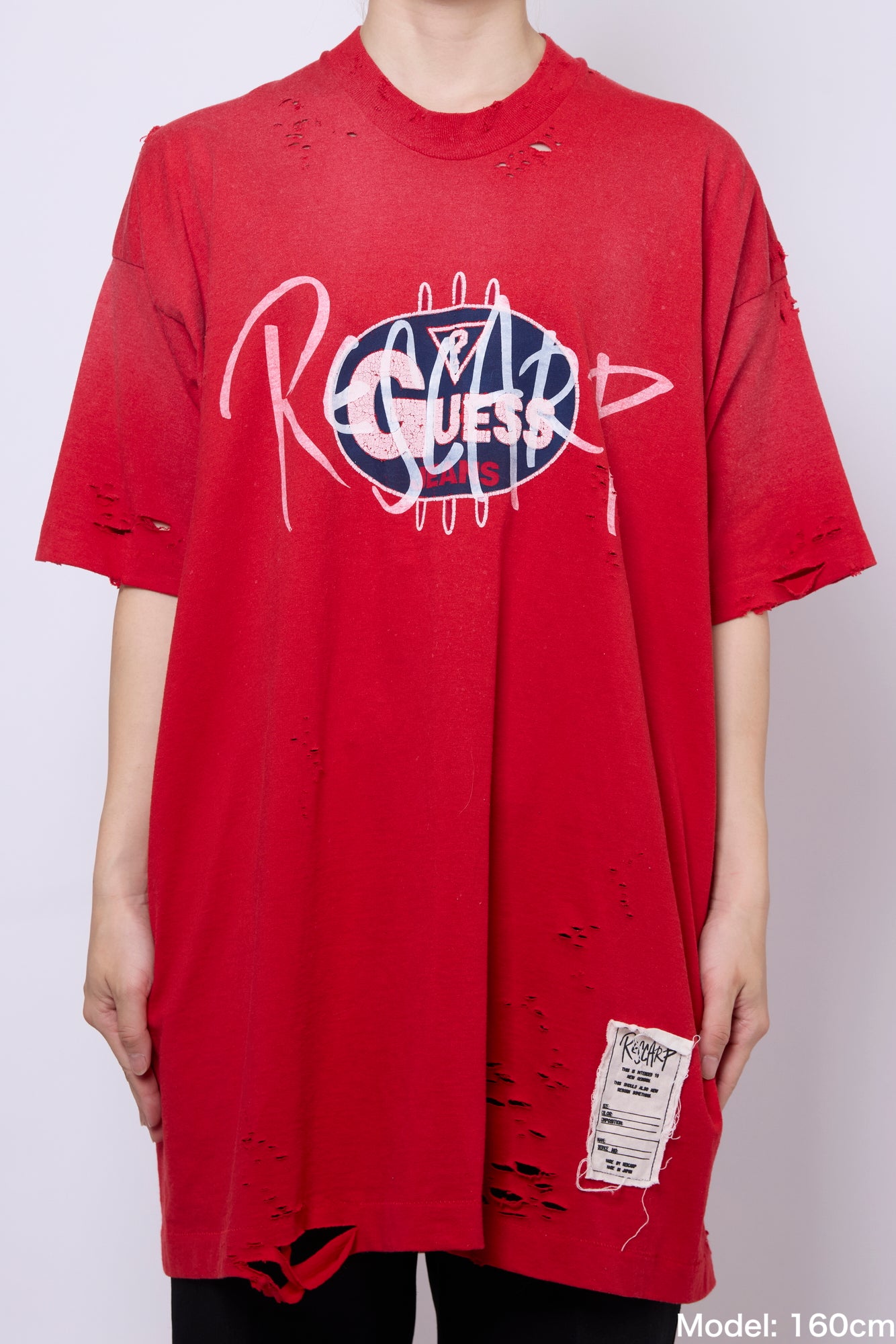 DAMAGED TEE