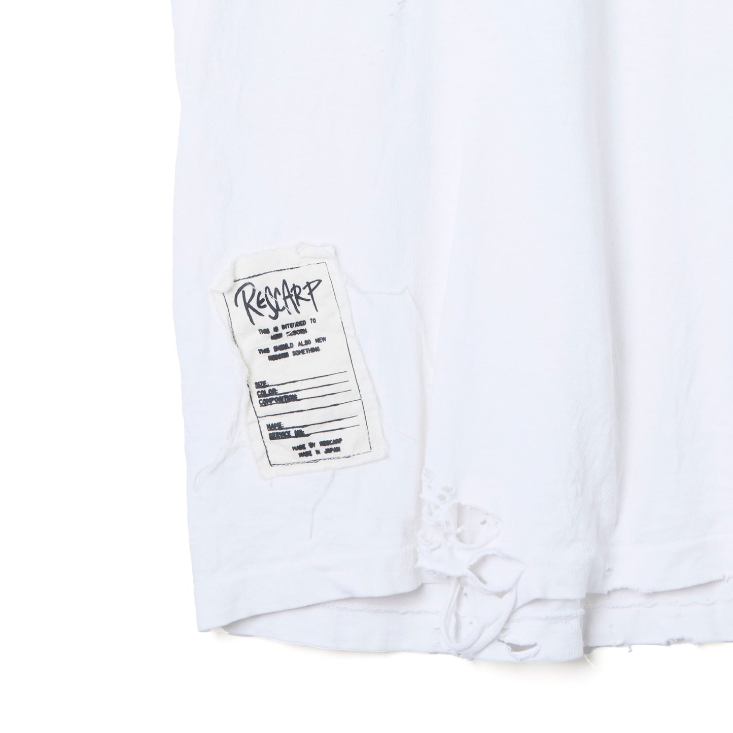 DAMAGED TEE