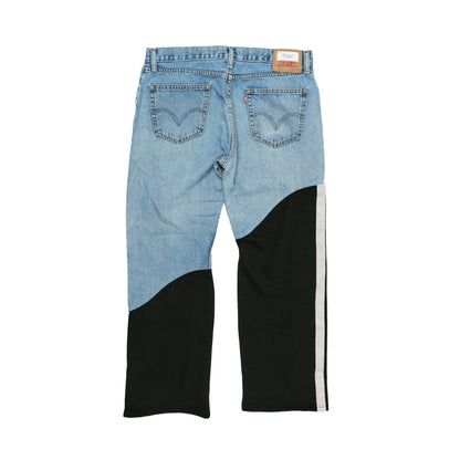 DIAGONAL-CUT DENIM PANTS