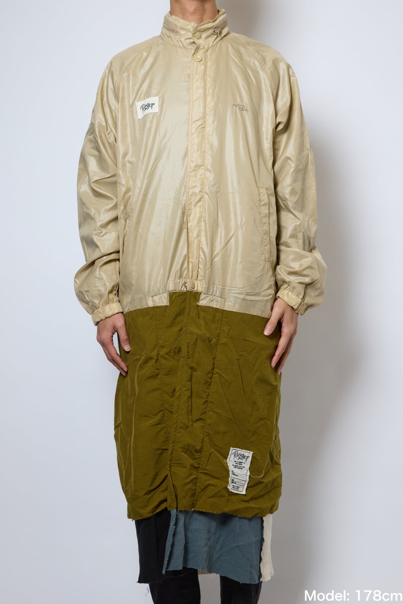 EXTENDED SWING TOP COAT