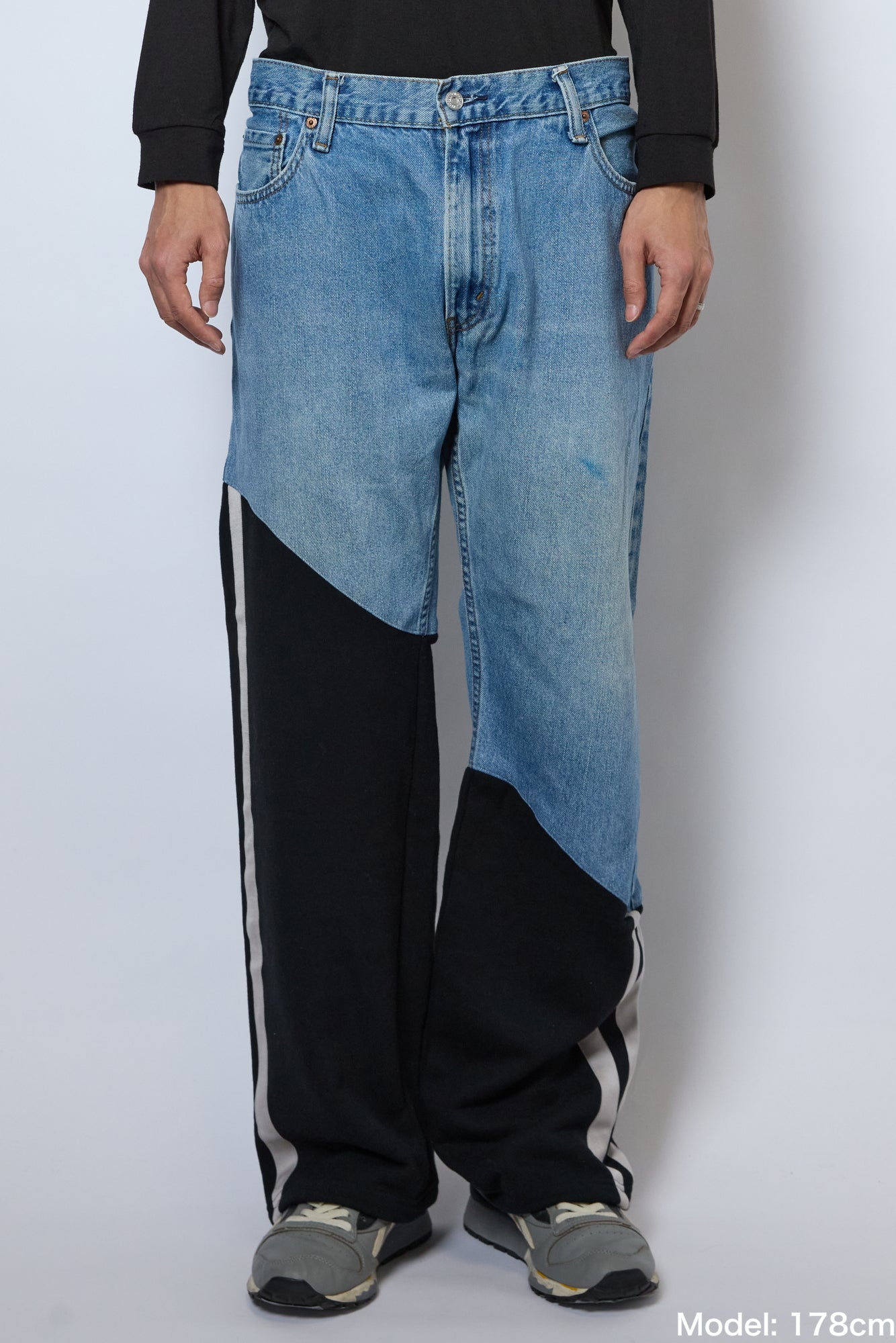 DIAGONAL-CUT DENIM PANTS