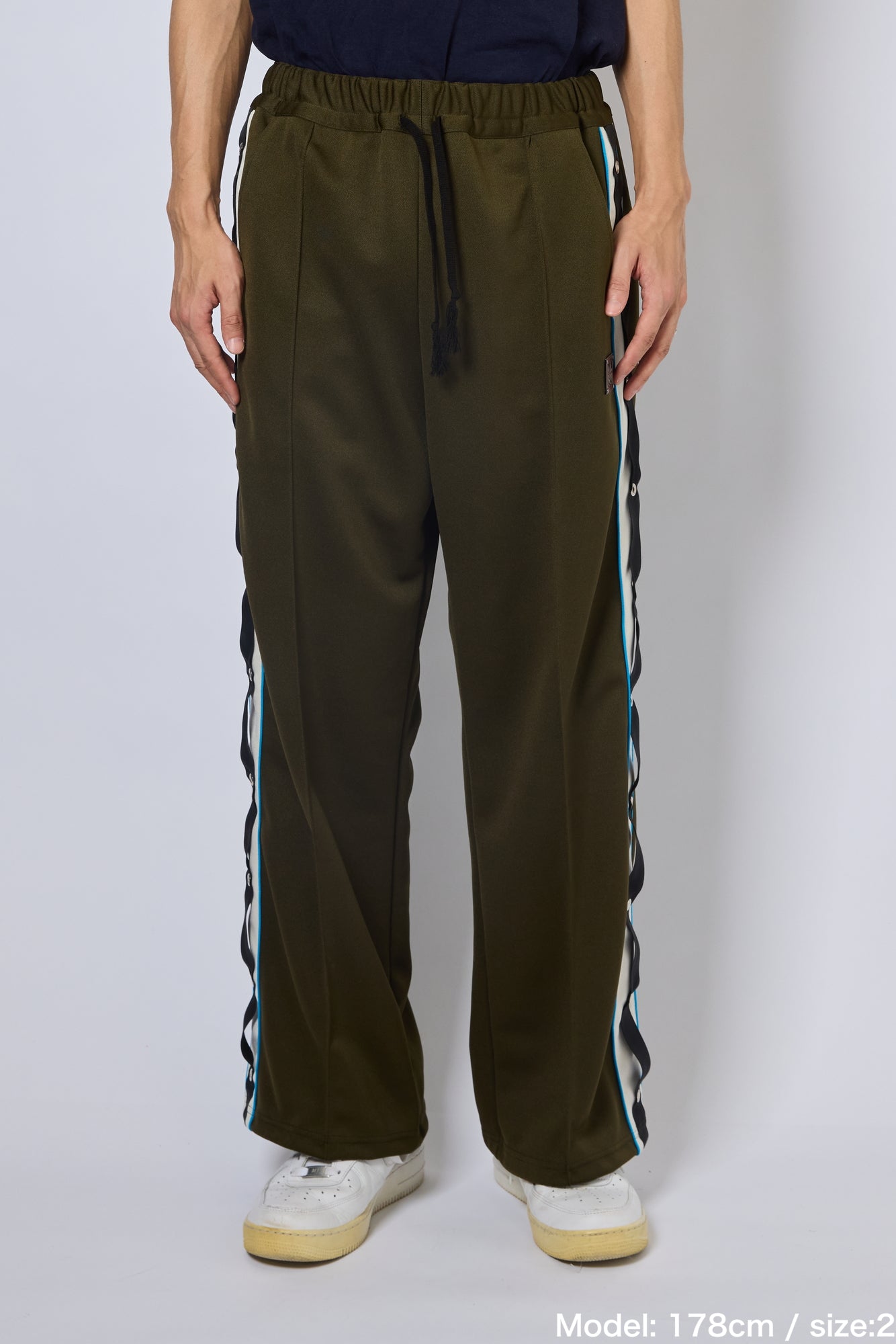 EYELET TRACK PANTS